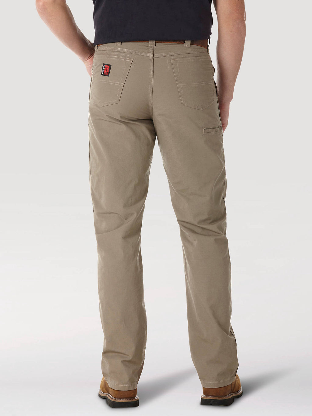 Back view of Wrangler RIGGS Technician pants in Dark Khaki, showing the rear pockets.