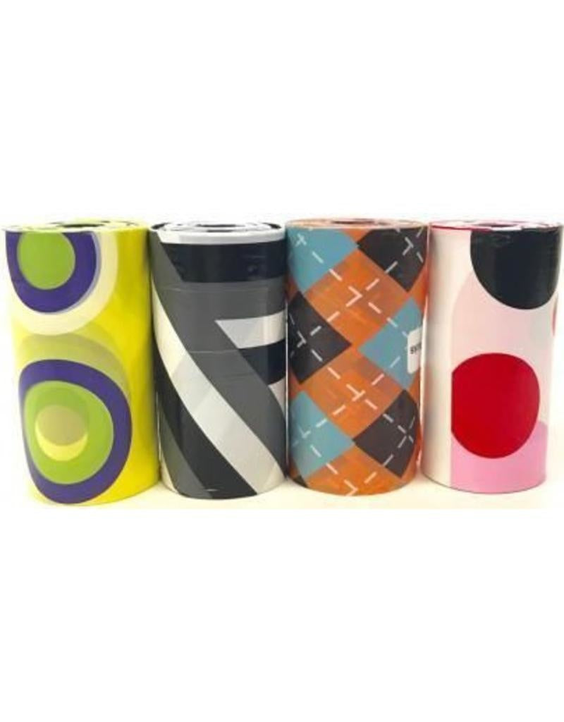 Four rolls of dog waste bags featuring colorful geometric, plaid, and polka dot patterns.