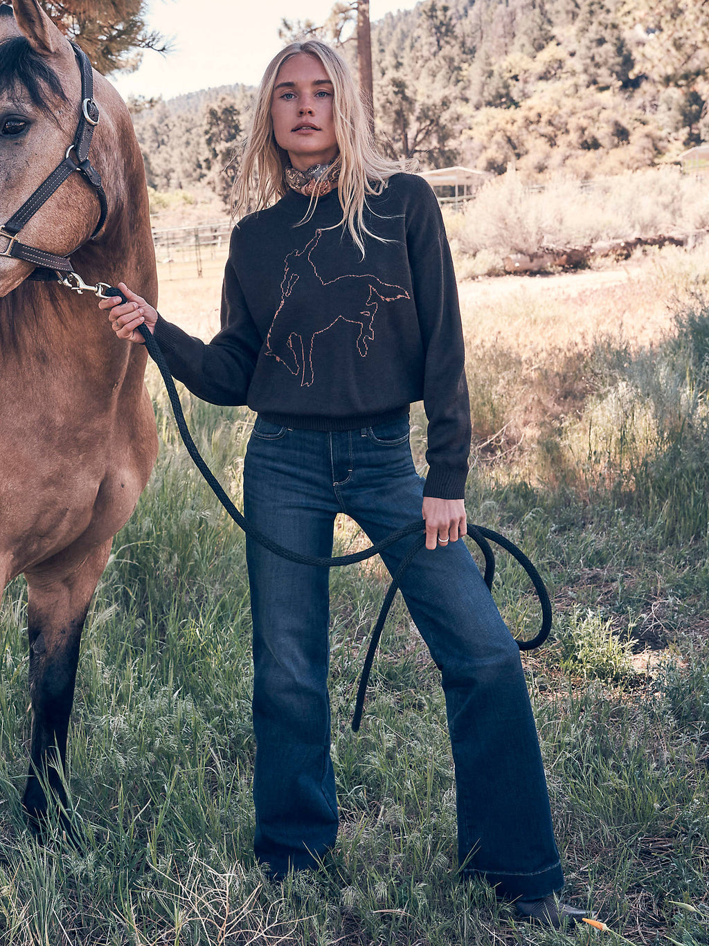 Wrangler Women's Bespoke High-Rise Trouser Jeans in Alexandra, outdoor view beside a horse