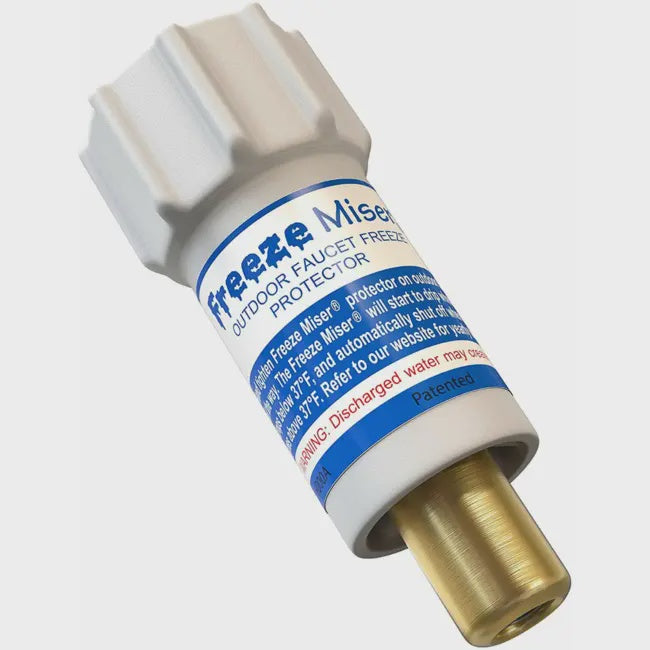 A Freeze Miser outdoor faucet protector with a white plastic top and a brass threaded base.