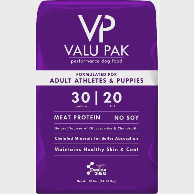 A 50-pound bag of Valu-Pak performance dog food for adult athletes and puppies.