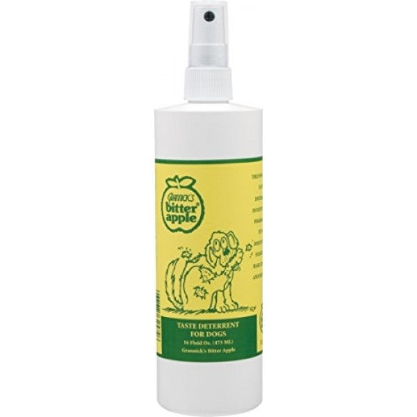 A white spray bottle of Grannick's Bitter Apple taste deterrent for dogs.