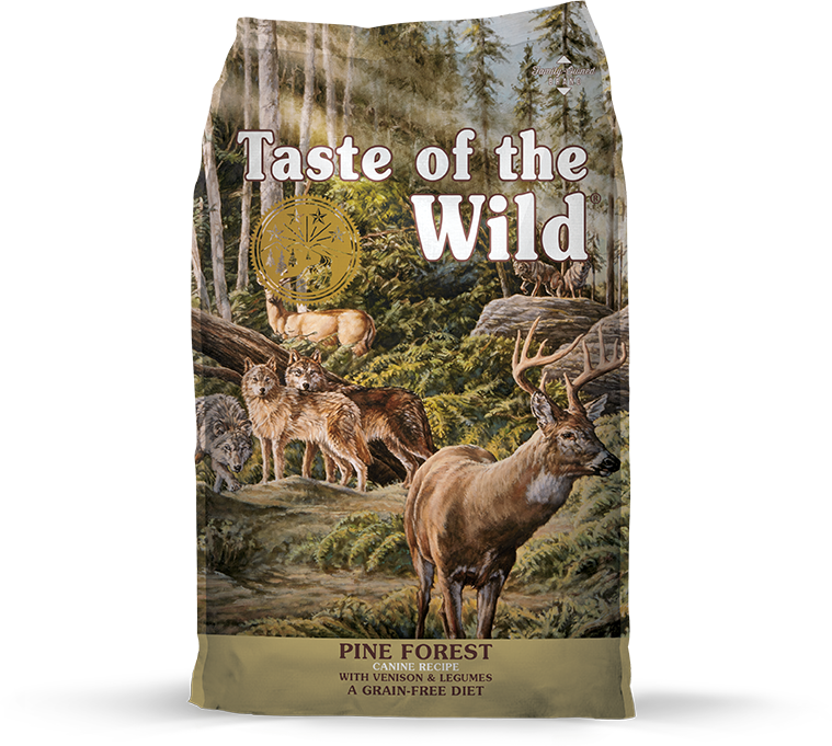 A bag of Taste of the Wild Pine Forest dog food featuring a forest scene with deer and wolves.