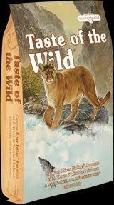 A bag of Taste of the Wild Canyon River Feline cat food featuring a mountain lion illustration.