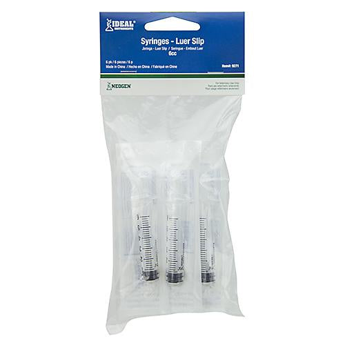 A six-pack of 6cc Luer Slip syringes in a clear plastic bag with a blue header card.