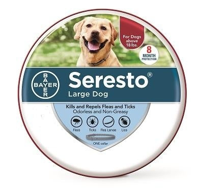 A round tin of Seresto flea collar for large dogs featuring a picture of a Labrador.