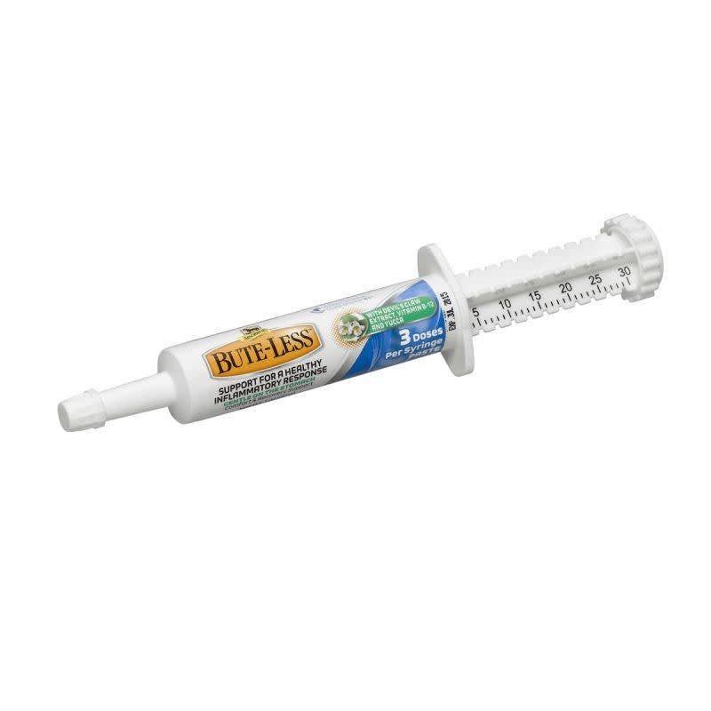 A white oral syringe of Absorbine Bute-Less paste with a graduated dosage scale.
