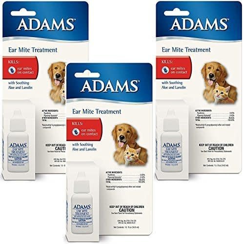 Three packages of Adams Ear Mite Treatment for dogs and cats, each with a bottle and box.