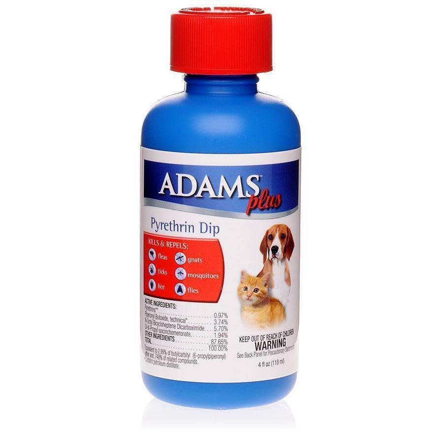 A bottle of Adams Plus Pyrethrin Dip with a red cap and a label featuring a dog and a cat.