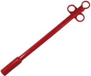 A red plastic balling gun with a long handle and a three-ring plunger mechanism.