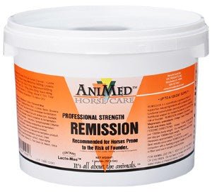 A white plastic tub of Animed Remission horse supplement with an orange and white label.
