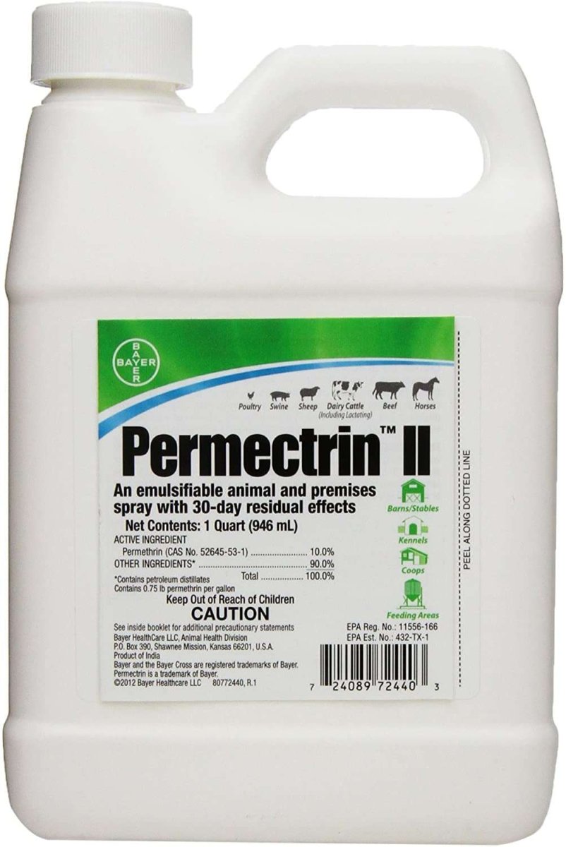 A one-quart white plastic jug of Bayer Permectrin II insecticide concentrate.