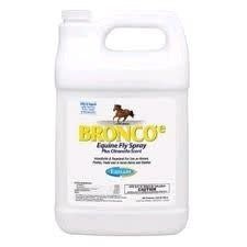 A white gallon jug of Bronco Equine Fly Spray with a handle and a label featuring a horse.