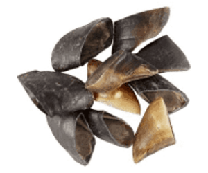 A pile of natural, dark-colored cow hooves for dogs.
