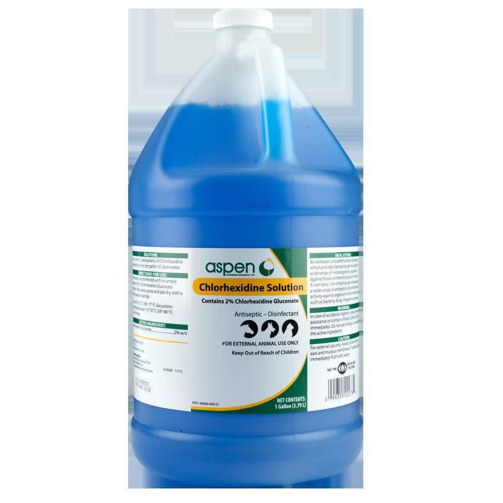 A one-gallon jug of Aspen Chlorhexidine Solution with a blue liquid inside.