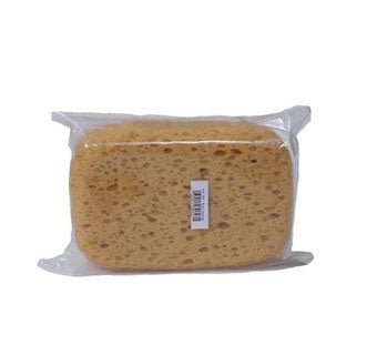 A rectangular yellow body sponge with an open-pore texture, packaged in clear plastic.