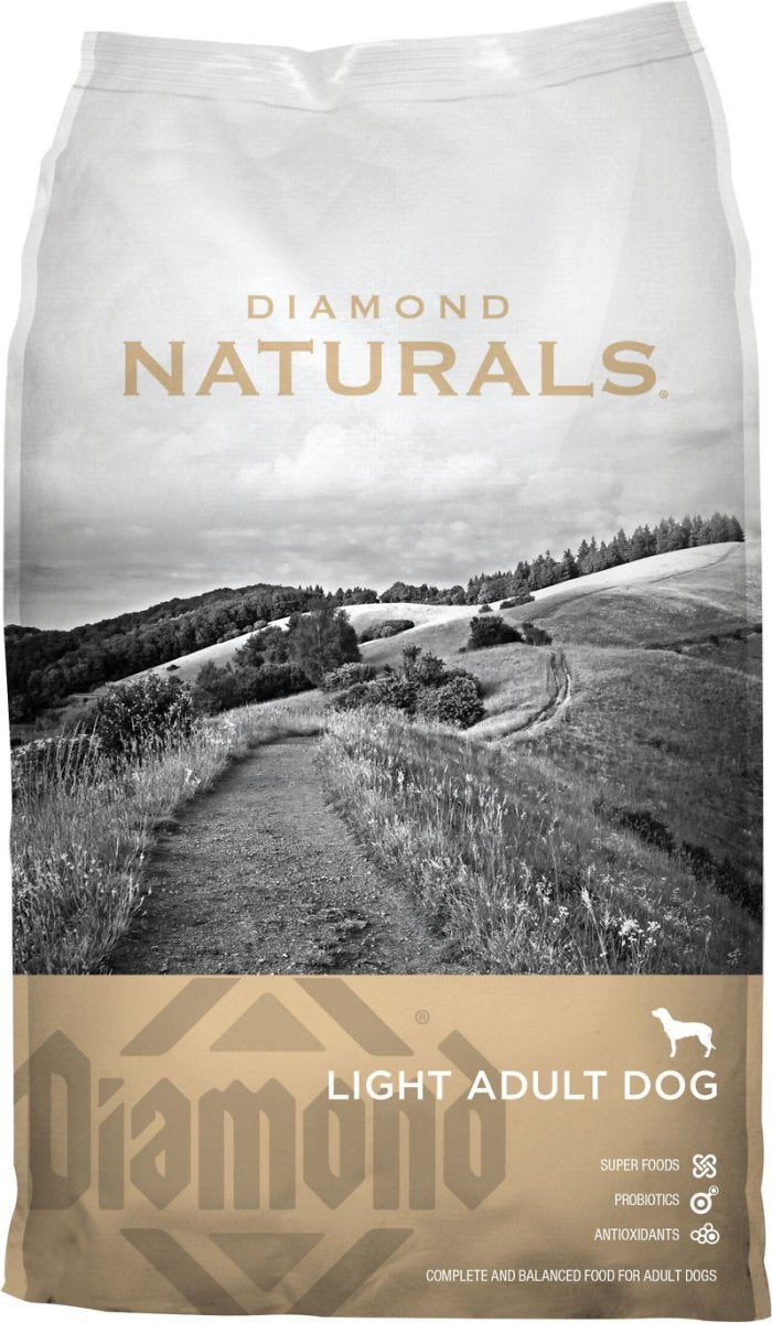 A bag of Diamond Naturals Light Adult Dog food featuring a landscape image on the front.