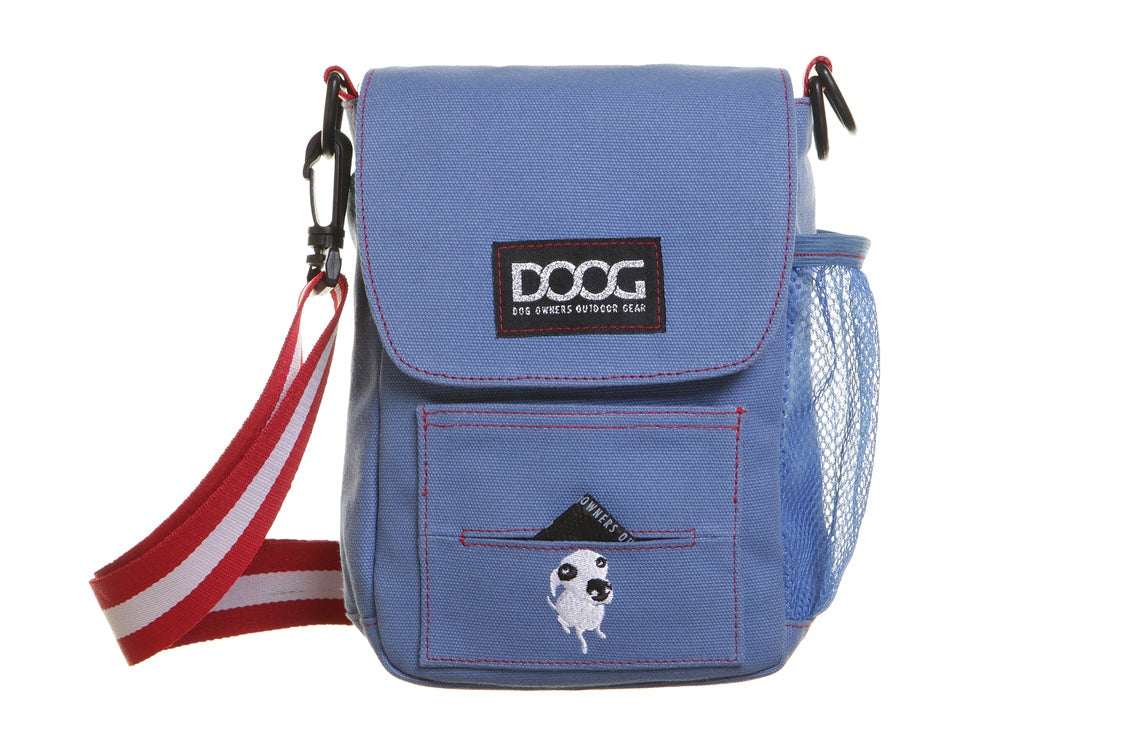 A blue cross-body dog walking bag with a striped strap, mesh side pocket, and embroidered dog icon.