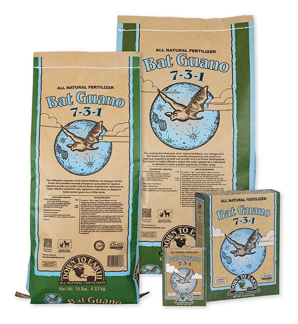 Four packages of Down To Earth Bat Guano fertilizer in various sizes.
