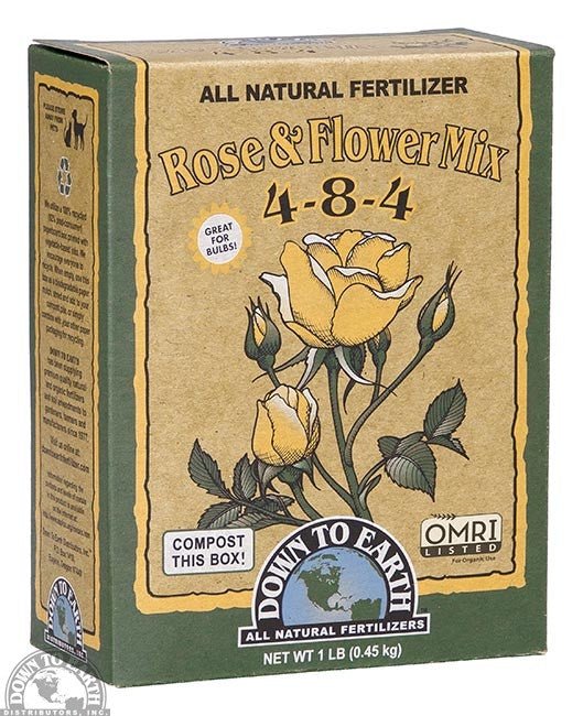 A one-pound box of Down to Earth Rose and Flower Mix fertilizer with a yellow rose illustration.
