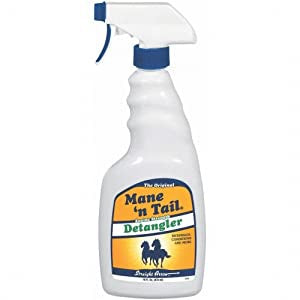 A white spray bottle of Mane 'n Tail Detangler with a blue trigger and a yellow label.