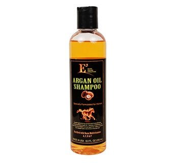 An eight-ounce bottle of E3 Argan Oil Shampoo with a black cap and amber-colored liquid.