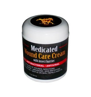 A six-ounce jar of E3 Medicated Wound Cream with a black label and a horse logo on the lid.