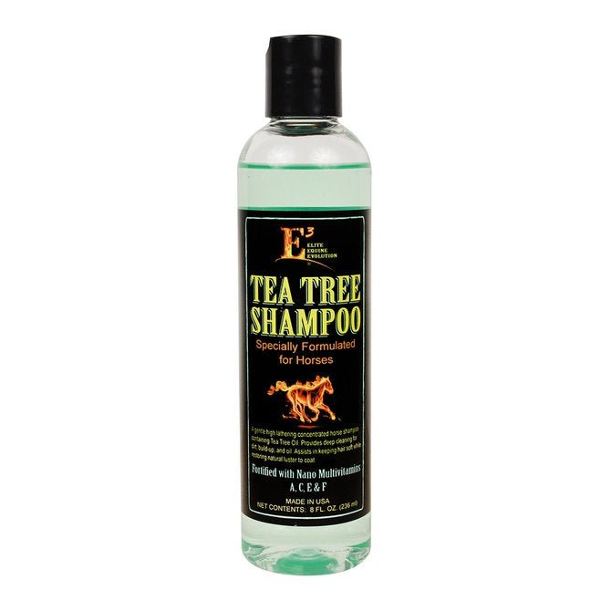 An eight-ounce bottle of E3 Tea Tree Shampoo for horses with a black label and flame graphic.