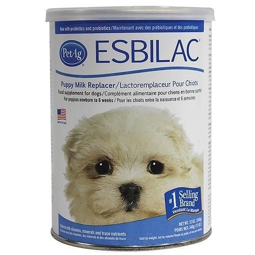 A 12-ounce canister of Esbilac puppy milk replacer powder featuring a puppy on the label.