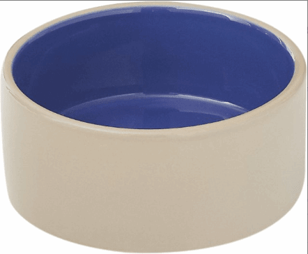 A five-inch round ceramic dog bowl with a beige exterior and a blue interior.