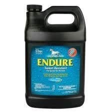 A black plastic jug of Farnam Endure sweat-resistant fly spray for horses.