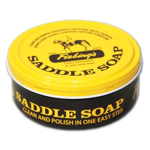 A round tin of Fiebing's Saddle Soap with a yellow lid and black base.