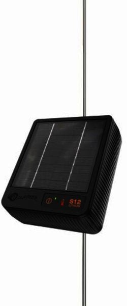 A black Gallagher S12 solar fence energizer mounted on a vertical metal post.