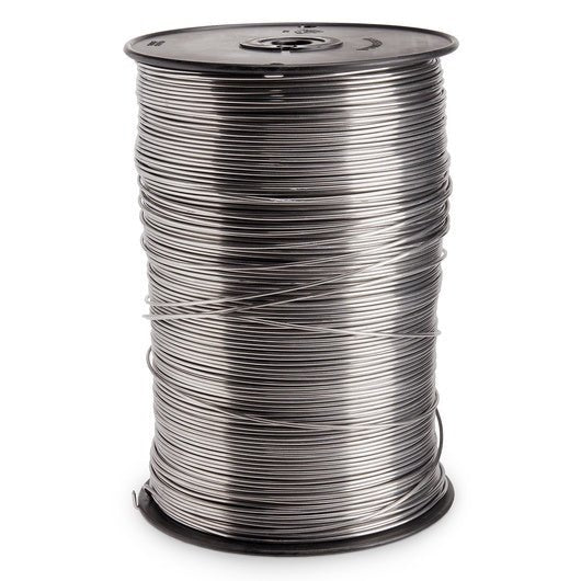 A large spool of silver-colored aluminum wire for electric fencing.