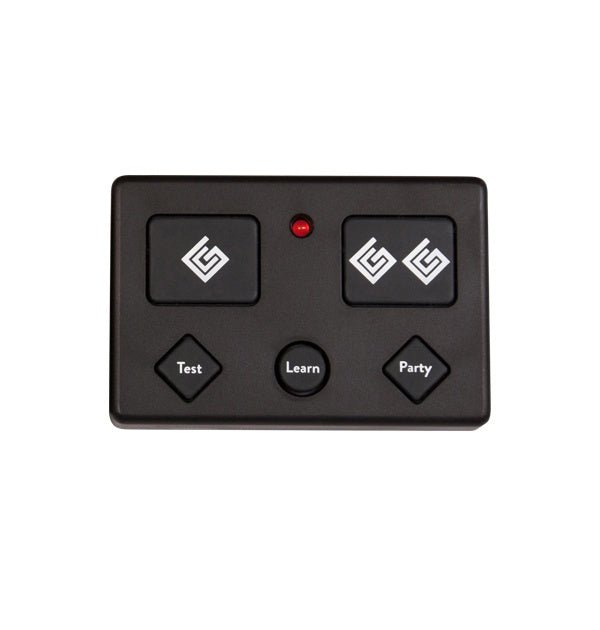 A black Ghost Controls five-button remote transmitter with a central LED indicator light.