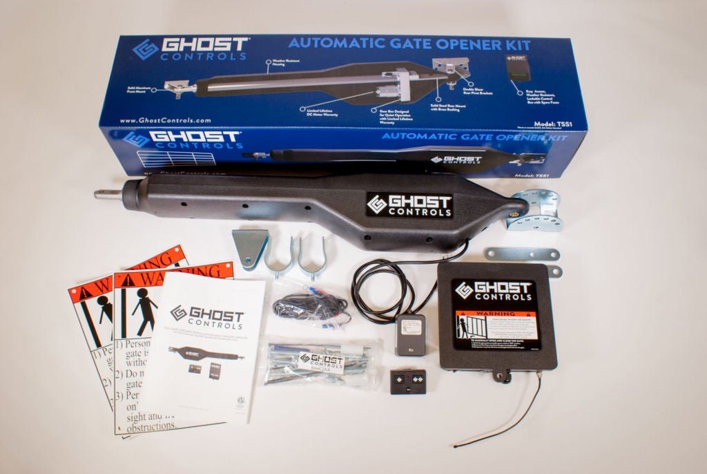 Ghost Controls TSS1 single gate opener kit with operator arm, control box, and mounting hardware.
