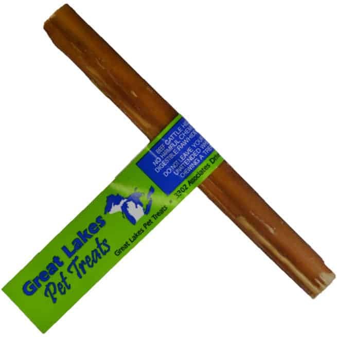 A single brown bully stick wrapped in a green Great Lakes Pet Treats label.