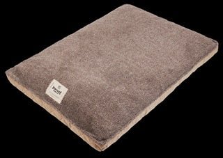 A rectangular brown microsuede dog bed with a small brand tag on the corner.
