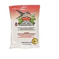 A packet of Perky-Pet hummingbird instant nectar concentrate with a hummingbird illustration.