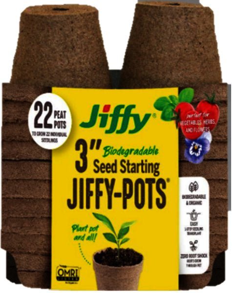 A stack of twenty-two brown, three-inch biodegradable peat pots for starting seeds.