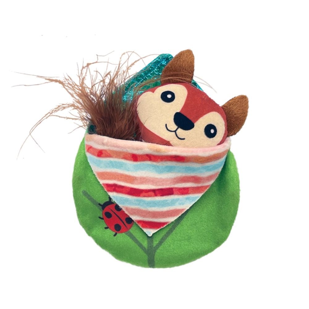 A plush squirrel toy peeks out from a green leaf-shaped pouch with a ladybug print.