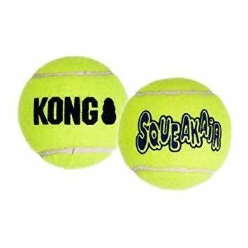 Two bright yellow KONG SqueakAir tennis balls for dogs are shown against a white background.