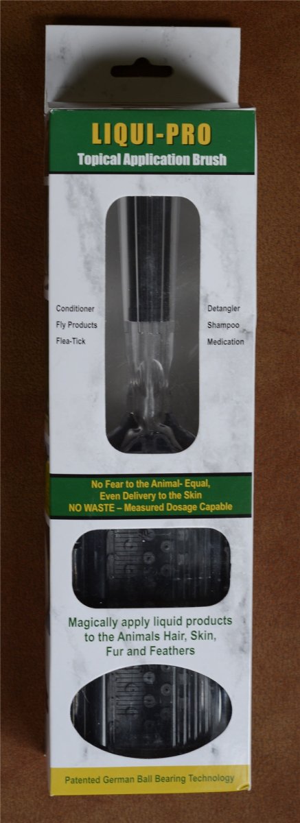 A Liqui-Pro topical application brush in its white and green retail packaging.