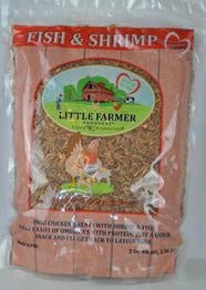 A clear plastic bag of Little Farmer brand fish and shrimp chicken treat.