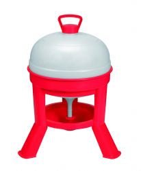 A red and white plastic poultry waterer with a top-fill dome and a base tray.