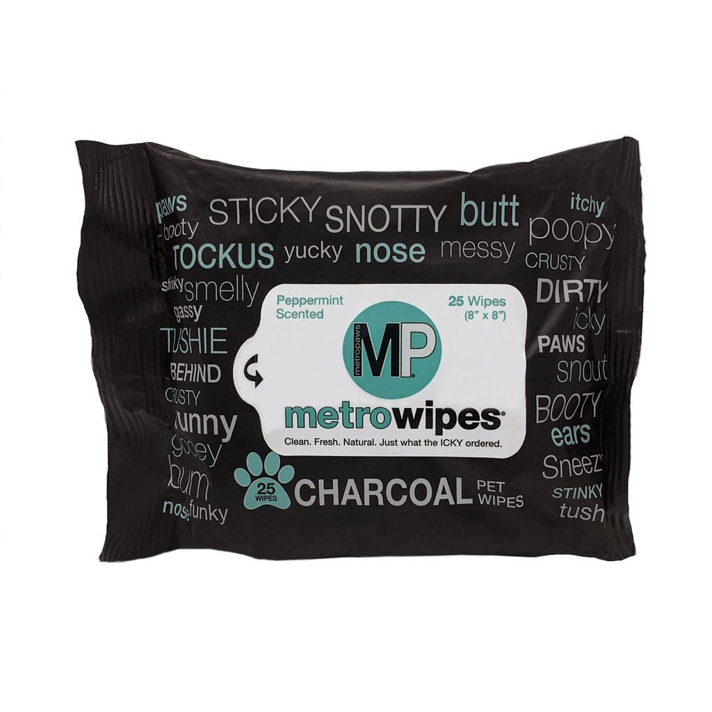 A black package of MetroPaws charcoal pet wipes with a white label and peppermint scent.