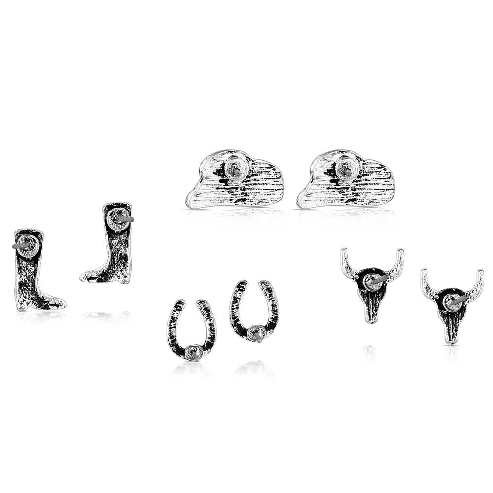 A set of four pairs of western-themed post earrings featuring cowgirl boots, hats, horseshoes, and skulls.
