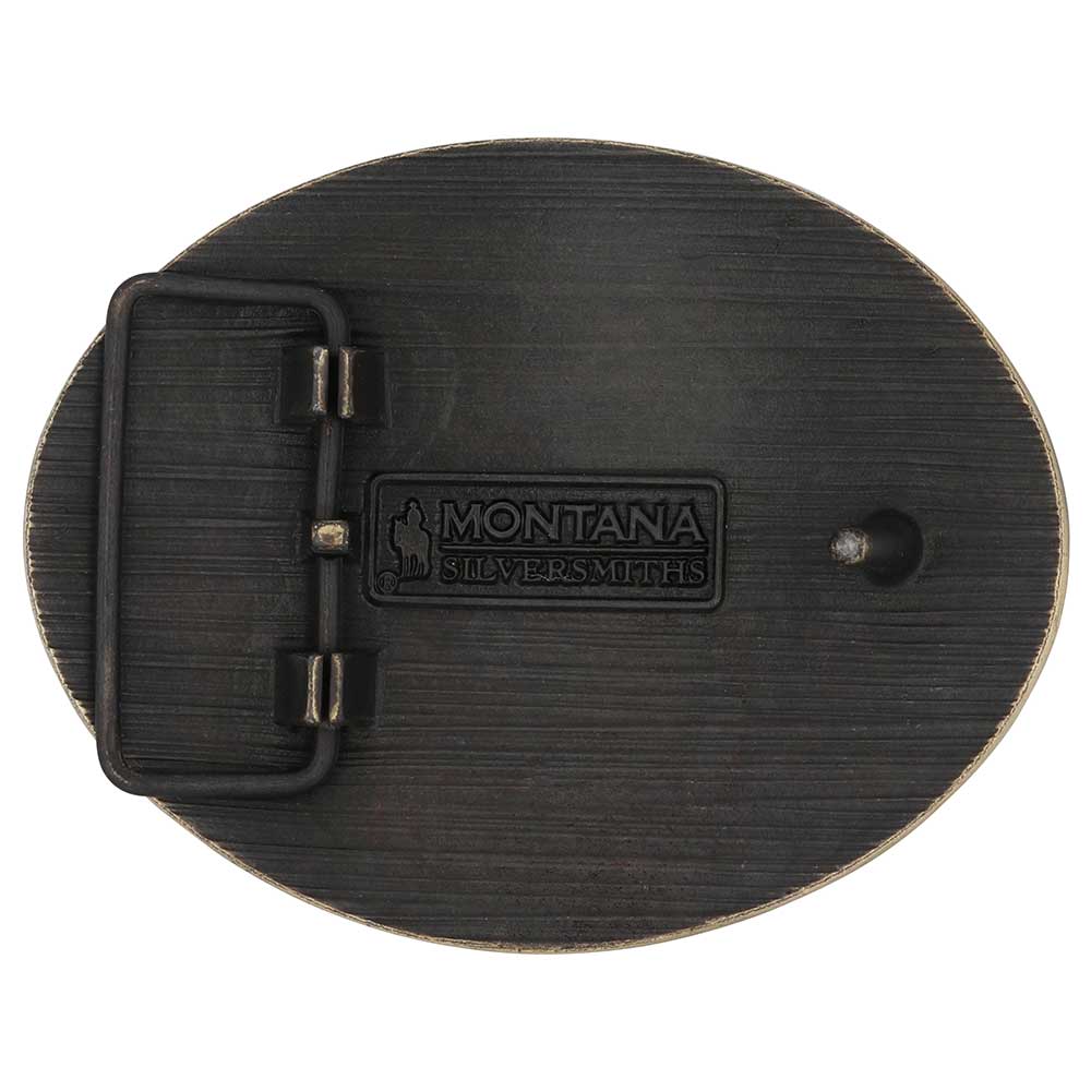 The back of an oval Montana Silversmiths belt buckle featuring a dark, brushed metal finish.