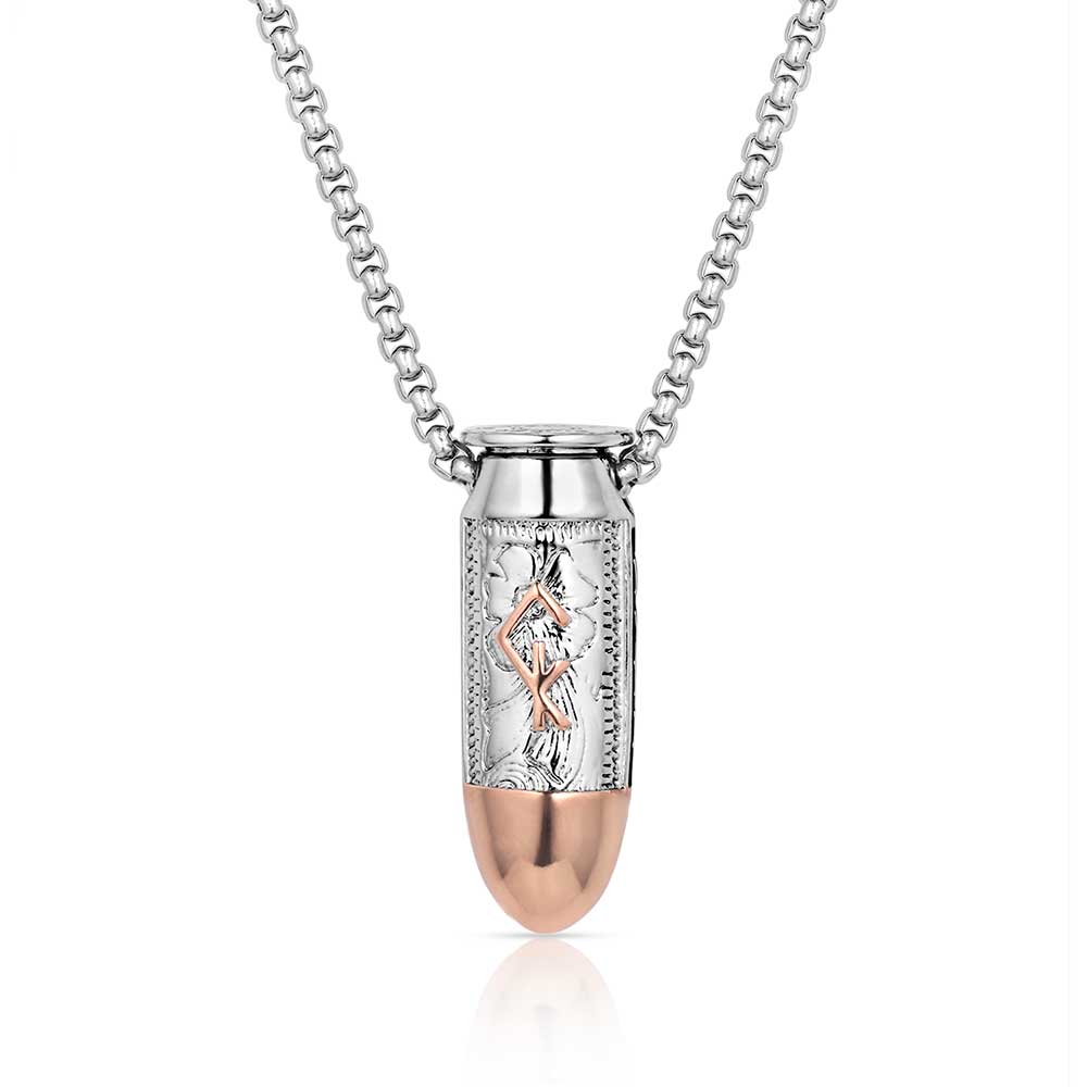 A silver and rose gold bullet pendant necklace featuring an engraved rune on a silver chain.