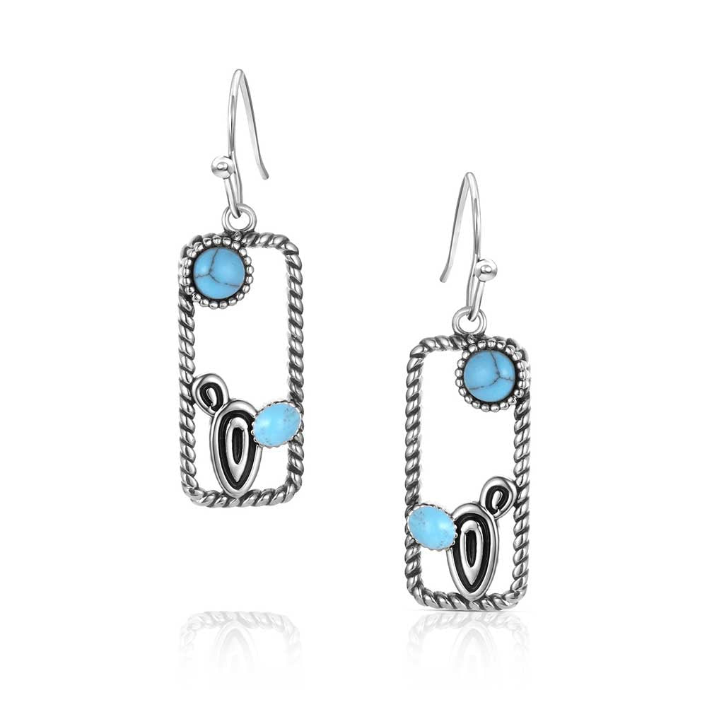 Silver rectangular earrings featuring twisted rope borders, turquoise stones, and cactus accents.